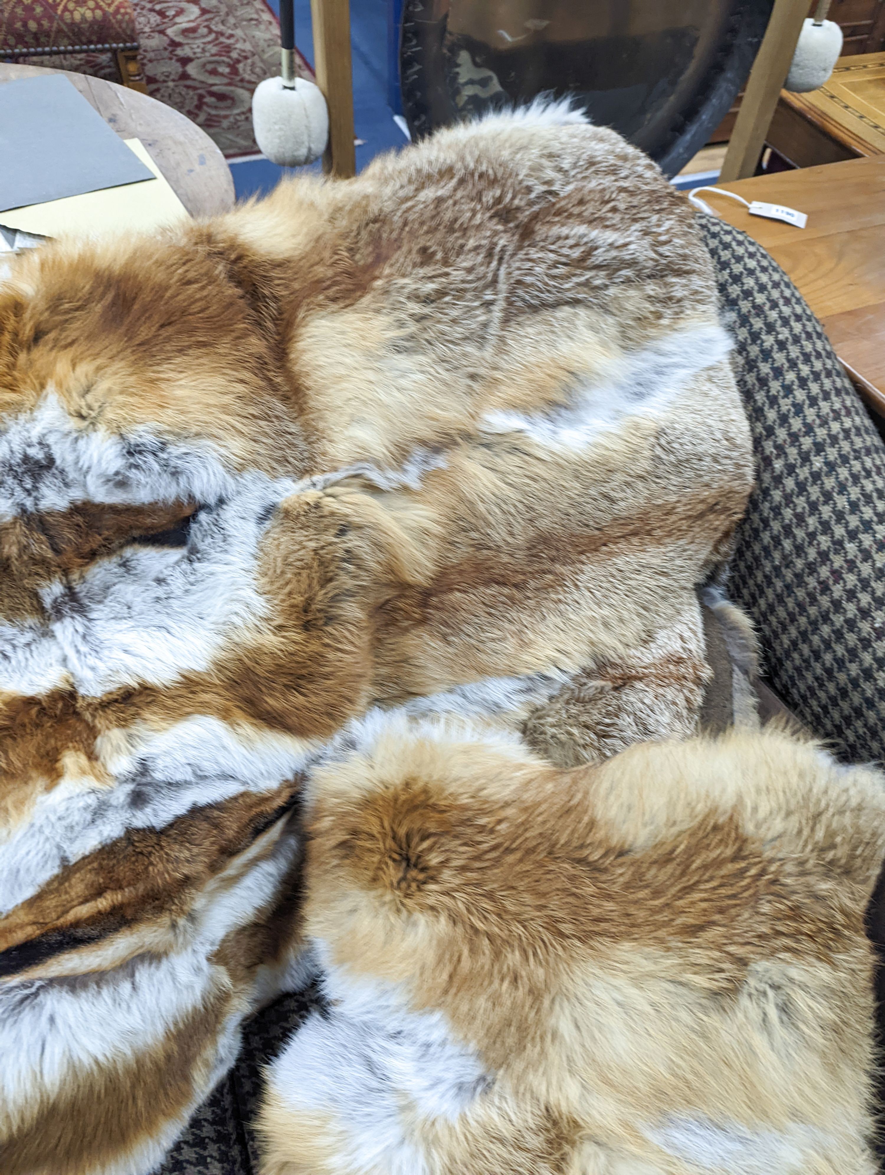 A German red fox fur throw with cashmere and wool back 180 x 135 cms and two red fox fur cushions.